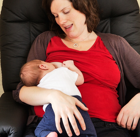 new mother breastfeeding baby